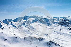 Winter snow covered mountain peaks