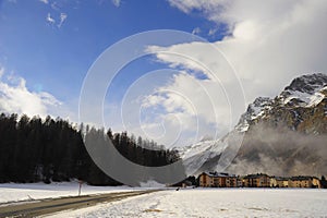 Winter snow mountains landscape and Engadin Valley Sils Maria in the swiss Alps photo