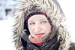 Winter snow outdoor portrait of woman