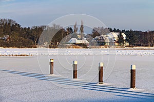 Winter with snow at the port in Prerow, Germany