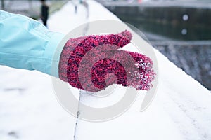 Winter snow in woman hand