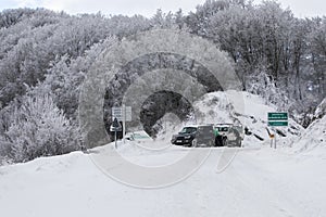 Winter snowfall in Collada De Bracons road, La Garrotxa, Girona, Spain photo