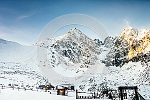 Winter, snowy landscape with mountains full of snow. Beautiful landscape in the mountains on a sunny day skiing