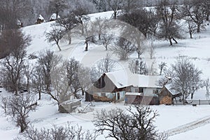 Winter snowy landscape of the transylvanian village