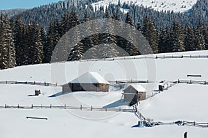 Winter snowy mountains, and lone farmhouse