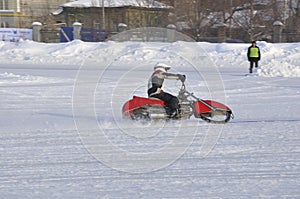Winter speedway the icy track, the driver turns