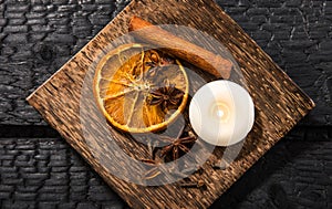 Winter spices concept. Flat lay view of various spices: cinnamon stick  clove  star anise  dried orange slices.