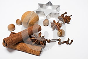 Winter Spices on white background. Mulled wine or Christmas seasonal baking ingredients - aroma spices