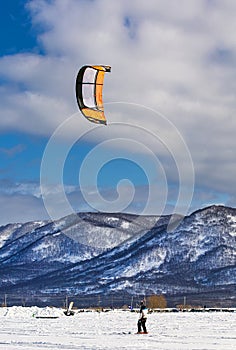 Winter sports festival Snowy Way in Kamchatka. Winter kiting competitions.