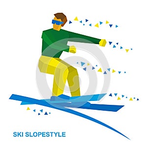Winter sports - Ski Slopestyle. Freestyle skier jumps an obstacle photo