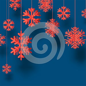 Winter square blue background with coral paper kirigami snowflakes