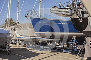 Winter storage of boats and yachts in a yacht club. Special technologies to protect boats from damage.