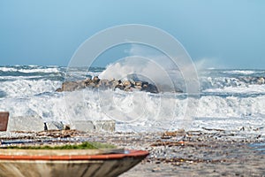 Winter storm against the beach. Waves and wind