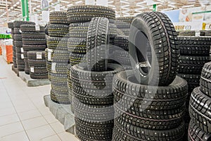 winter studded tires in the supermarket of automobile tires a