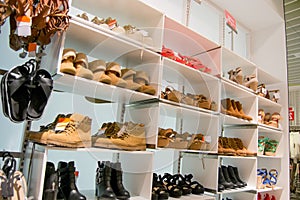 Winter and summer type of shoes selected and placed in order according to the latest fashion trends