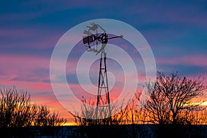 Windmill Sunrise On The Prairies