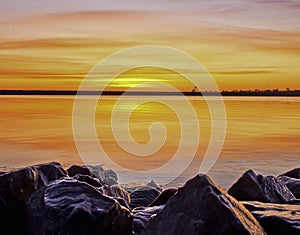 Winter Sunrise Over A Calm Colorado Lake