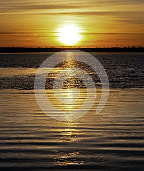 Winter Sunrise Over A Calm Colorado Lake