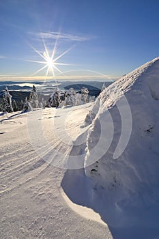Zimní východ slunce na Ráztocké holi v Nízkých Tatrách