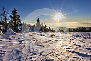 Winter sunrise on Velka Raca mountain on Kysucke Beskydy