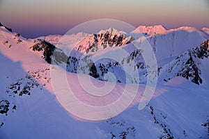 Winter sunset landscape in the Transylvanian Alps - Fagaras Mountains.