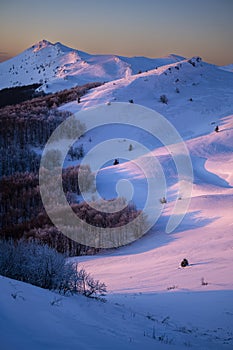 Winter sunset in the mountains. The Mount Krzemien, Bieszczady National Park, Poland