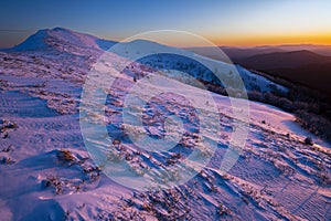 Winter sunset in the mountains. The Mount Rozsypaniec, Bieszczady National Park, Poland