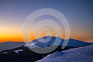 Winter sunset in the mountains. The Mount Tarnica, Bieszczady National Park, Poland