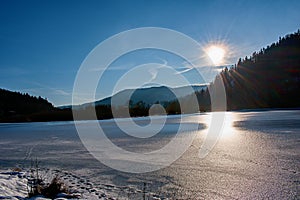 Winter sunset over the BÅ™ezovÃ¡ reservoir