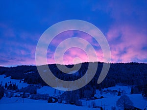 Winter sunset over the mountains, Black Forest