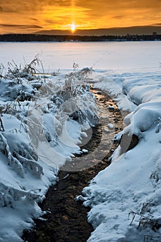 Winter sunset on the river in the month of January