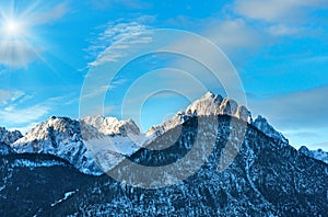 Winter sunshiny mountain top landscape Austria. photo