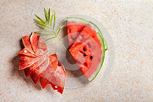 Winter supplies: slices of dried watermelon with fresh pieces on light background