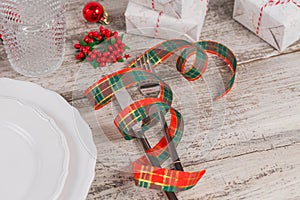 Winter table place setting with Christmas or New Year decorations