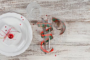 Winter table place setting with Christmas or New Year decorations