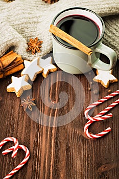 Winter theme. Hot steaming cup of glint wine with spices