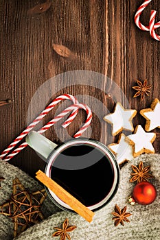 Winter theme. Hot steaming cup of glint wine with spices