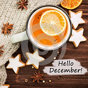 Winter theme. Hot tea with spices,orange,cinnamon,anise,cookies photo