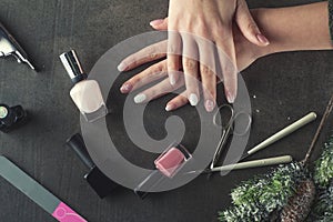 Winter theme nails design and manicure, instruments for manicure with needles