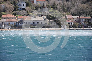 Winter time in Bakarac, with strong wind Bura (strong north wind on the Adriatic Sea) photo