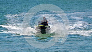 Winter time jet ski action on the Florida `intracoastal Waterway photo