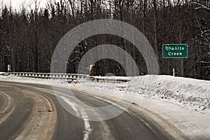 Glenn Hwy highway before a snowstorm close to Palmer on the way to Matanuska glacier from Anchorage, in Alaska. Granite Creek si