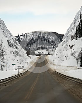 Glenn Hwy highway before a snowstorm close to Chugiak on the way to Matanuska glacier from Anchorage, in Alaska.