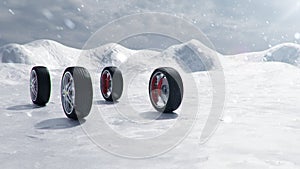 Winter tires on a background of snowstorm, snowfall and slippery winter road. Winter tires concept. Concept tyres