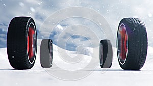 Winter tires on a background of snowstorm, snowfall and slippery winter road. Winter tires concept. Concept tyres