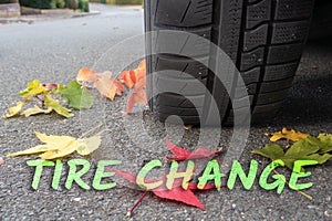 Winter tires with colorful autumn leaves and text tire change