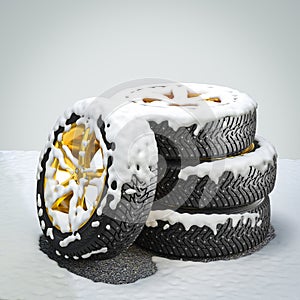 Winter tires with gold rims covered by snow