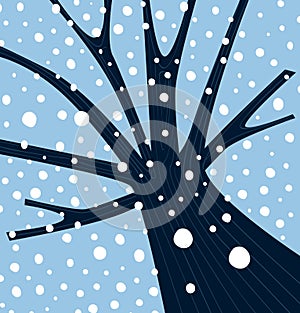 Winter tree with falling snow