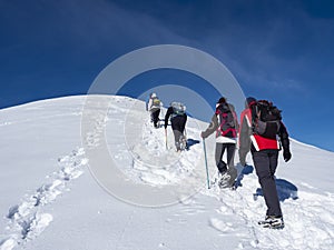 Winter trekking scene in the Italian alps