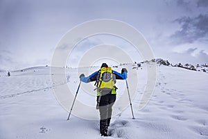 Winter trekking scene in the Italian alps of Valsassina